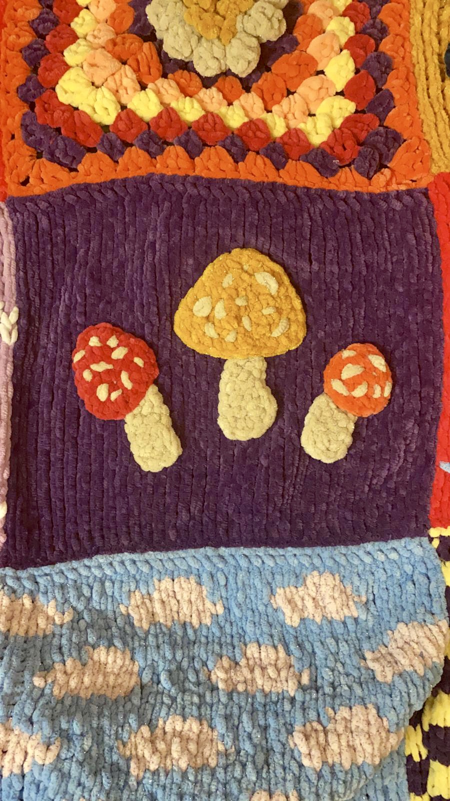 c111712a-8ef3-4b4a-b65b-282bdb130740.velvet-granny-square-patchwork-knit-blanket-throw